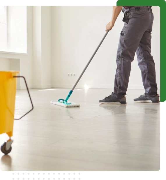 Workers wiping down surfaces during post-construction cleaning services in Edmonton.
