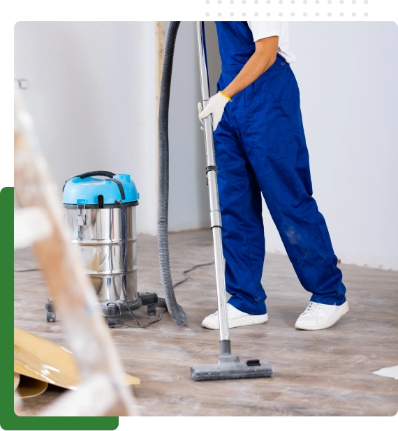 Team removing debris as part of post-construction cleaning services after a renovation project.