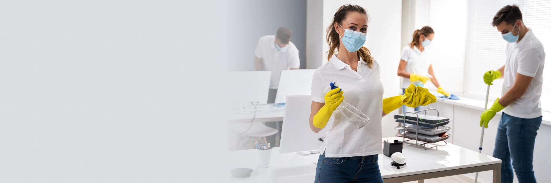 Technician performing disinfection services in Edmonton inside a corporate office.