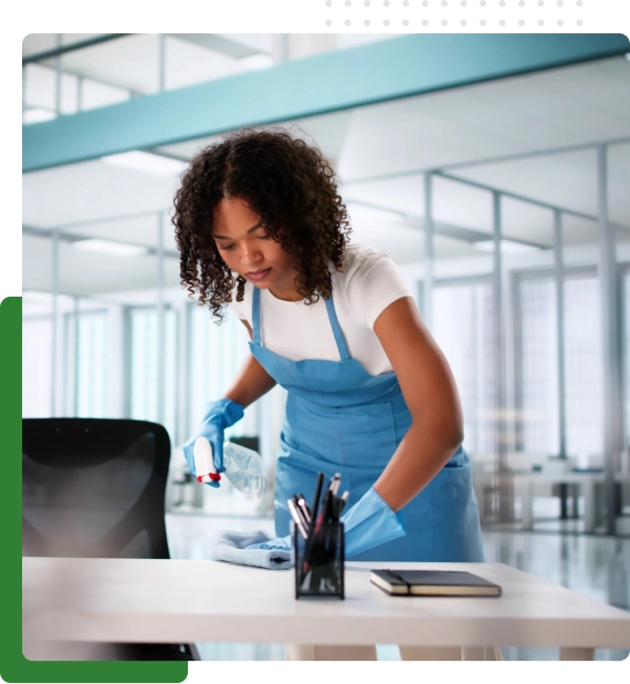 Workstations being sanitized during office cleaning services in Edmonton.