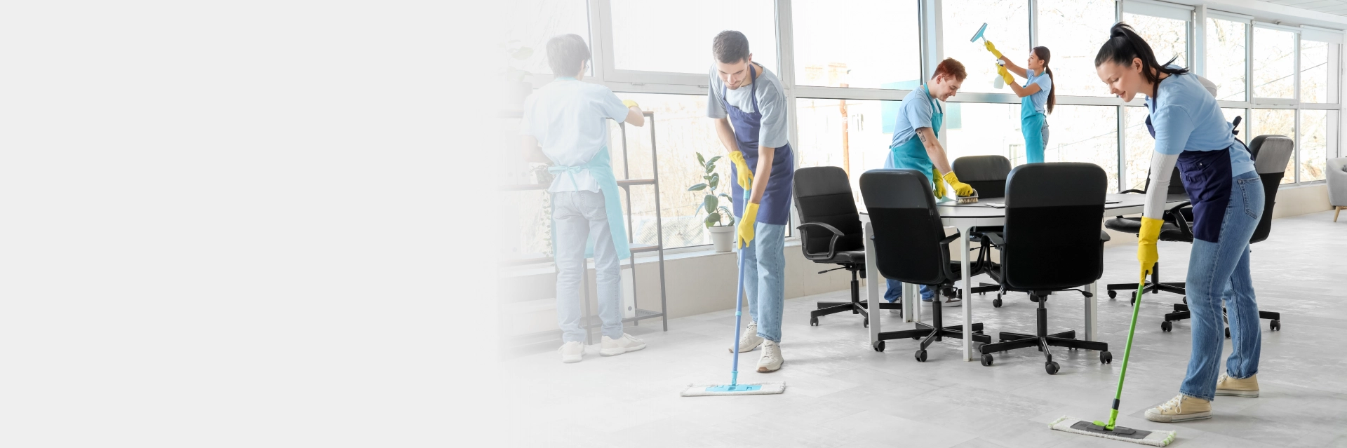 Team performing office cleaning services in Edmonton inside a modern workspace.