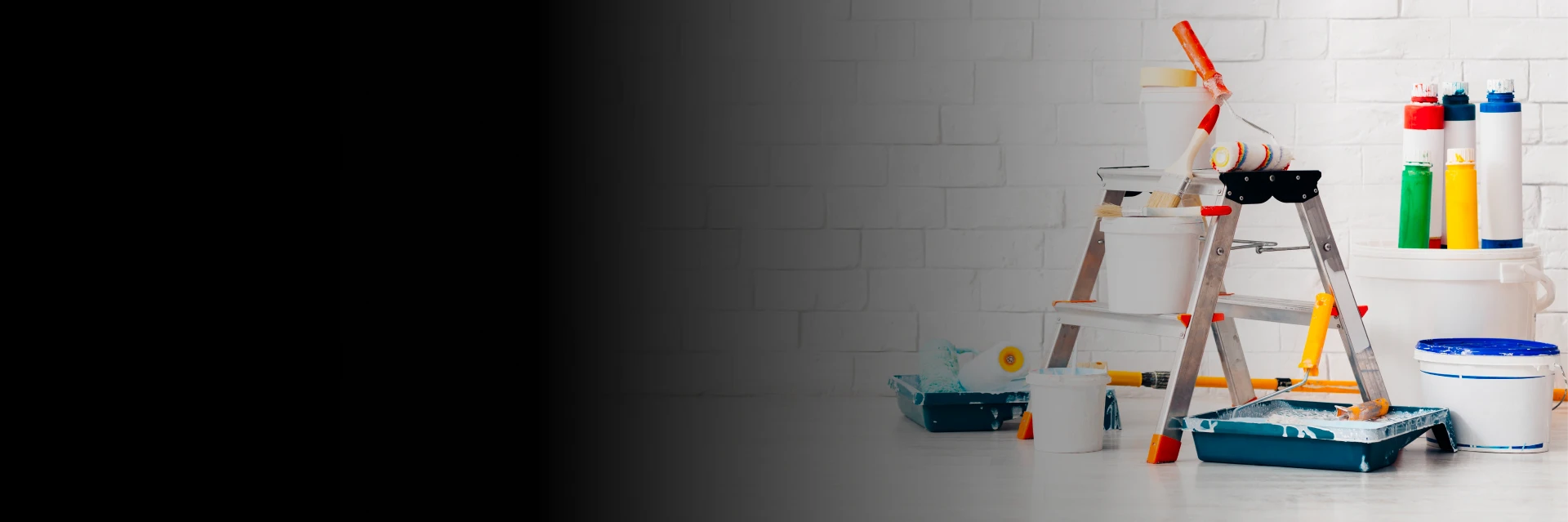 Exterior painting Calgary specialists refreshing a stucco and brick residential facade.