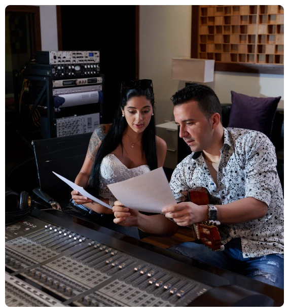 A one on one consultation session in a New York office offering music consulting in New York services.