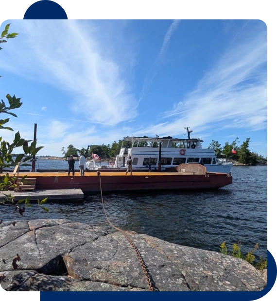 A group laughing together while exploring the waterways during a cruise near Georgian Bay.