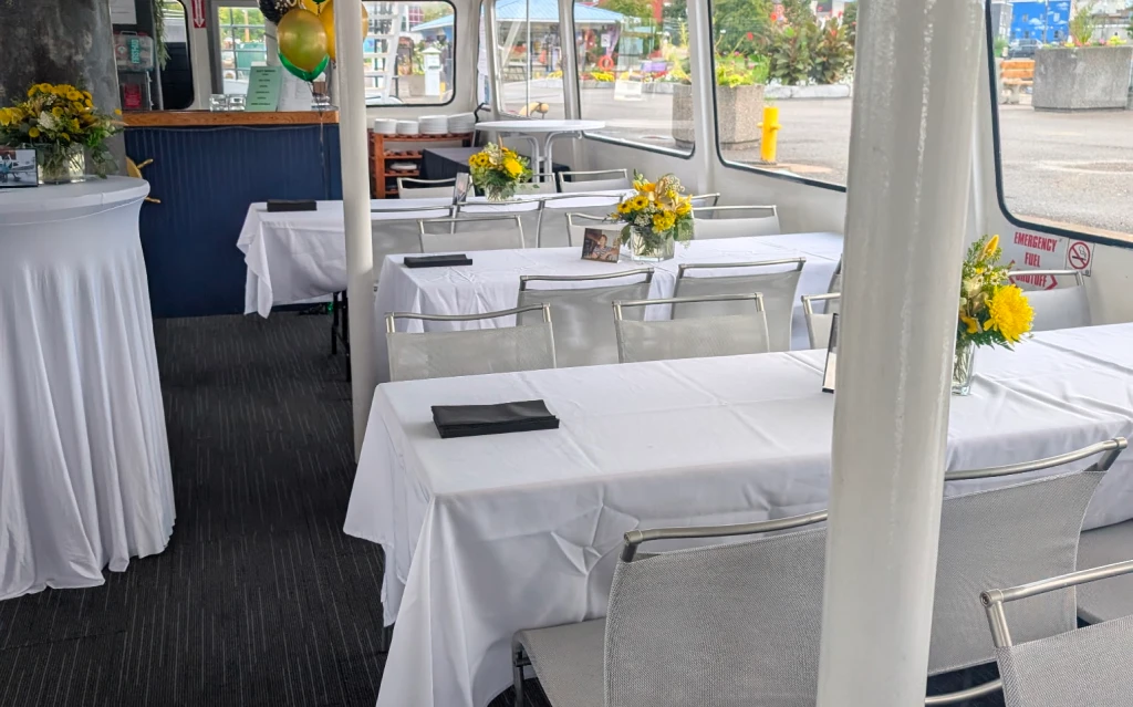 A couple celebrating their ceremony during wedding cruises while sailing through the scenic waters of Georgian Bay.