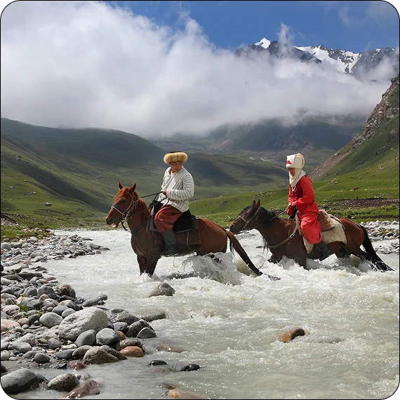 Group exploring mountain trails during Kyrgyzstan guided tours in Kyrgyzstan
