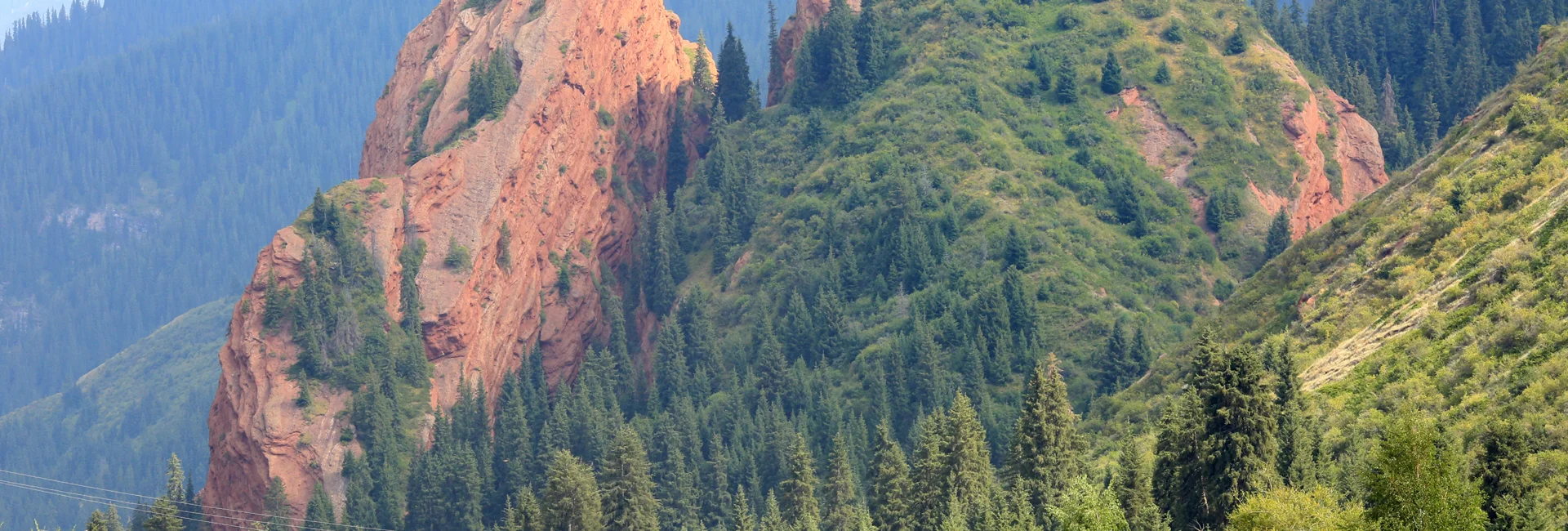 Travelers beginning private guided travel in Kyrgyzstan with a guide