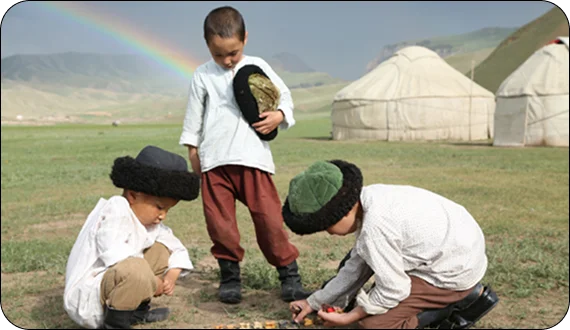 Couple relaxing after a summer tour trek in Kyrgyzstan