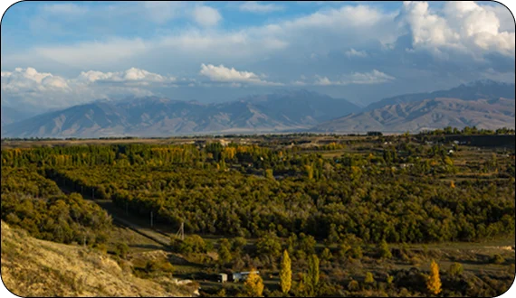 Guide explaining landscapes during hiking tours in Kyrgyzstan