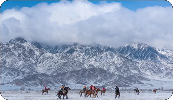 Visitors enjoying panoramic views during travel in Kyrgyzstan