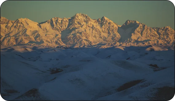 Guide briefing travelers before ski tours in Kyrgyzstan