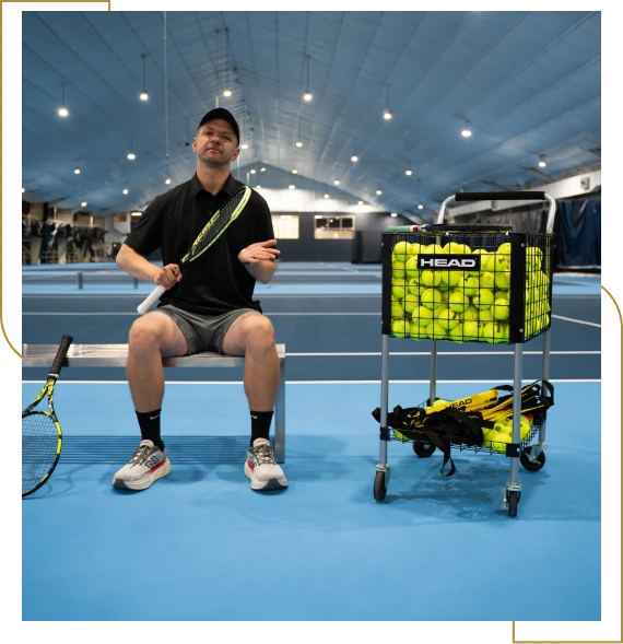 A coach guiding members during racquet sports classes during a training session in Burlington.
