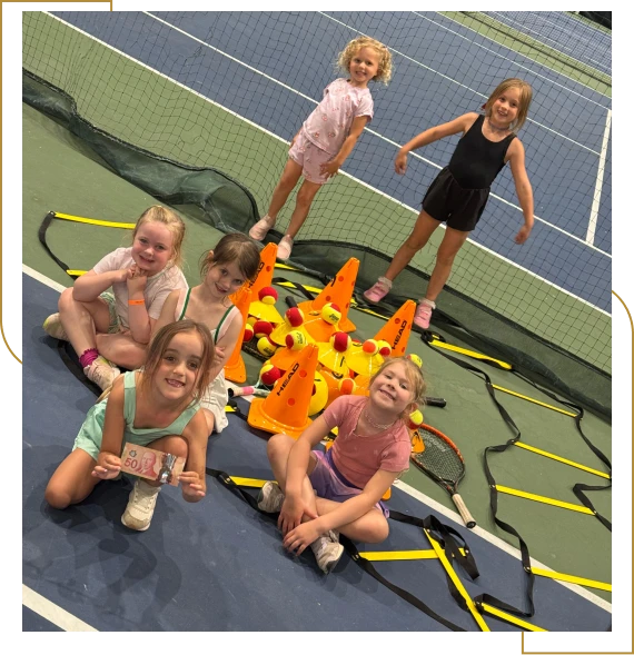 A group of kids playing sports together during holiday camps for kids.