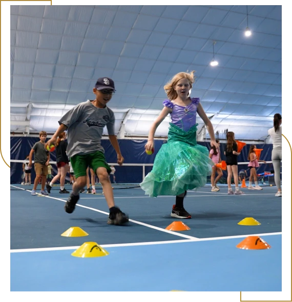 Children enjoying outdoor games and teamwork during summer camps for kids.
