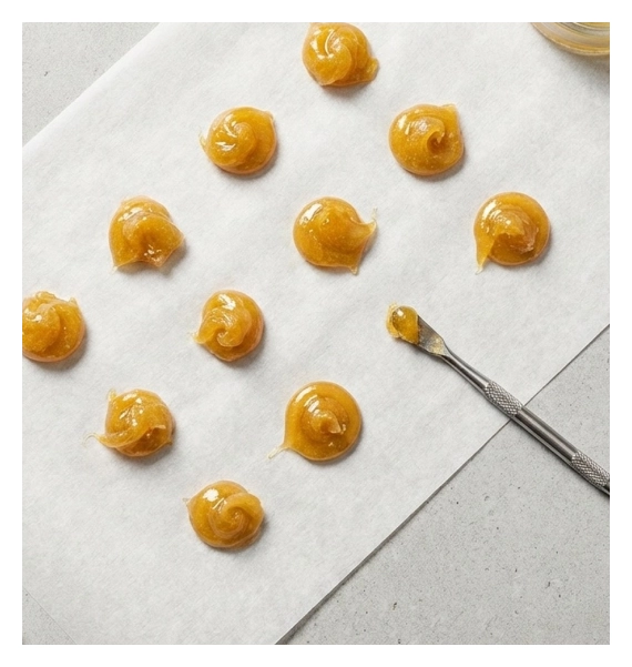 Budtender recommending THC wax in Kansas City to a shopper