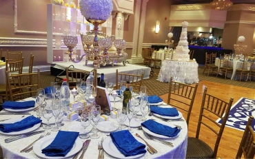 Guests seated in a venue styled with decor rental services in Woodbridge