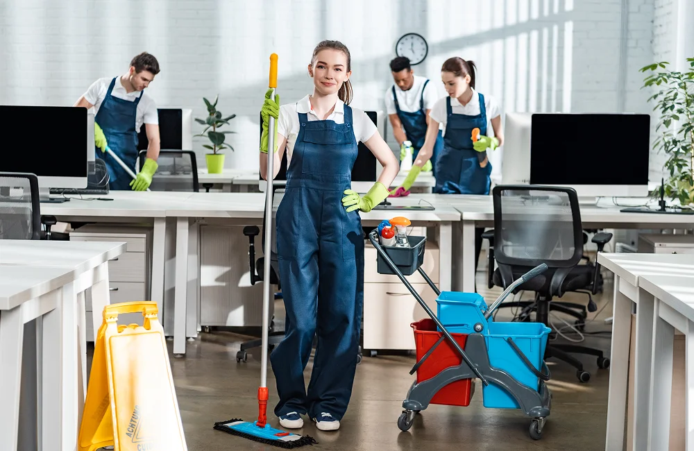  Workers delivering sanitization services in Atlanta in a conference room
