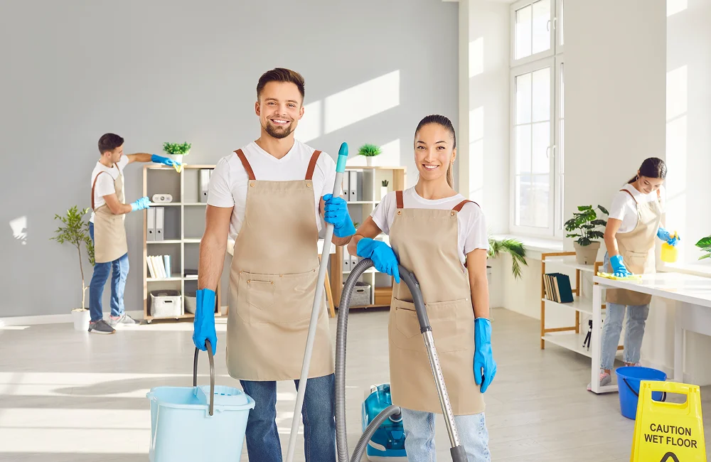  Staff completing sanitization services in Atlanta in a shared workspace