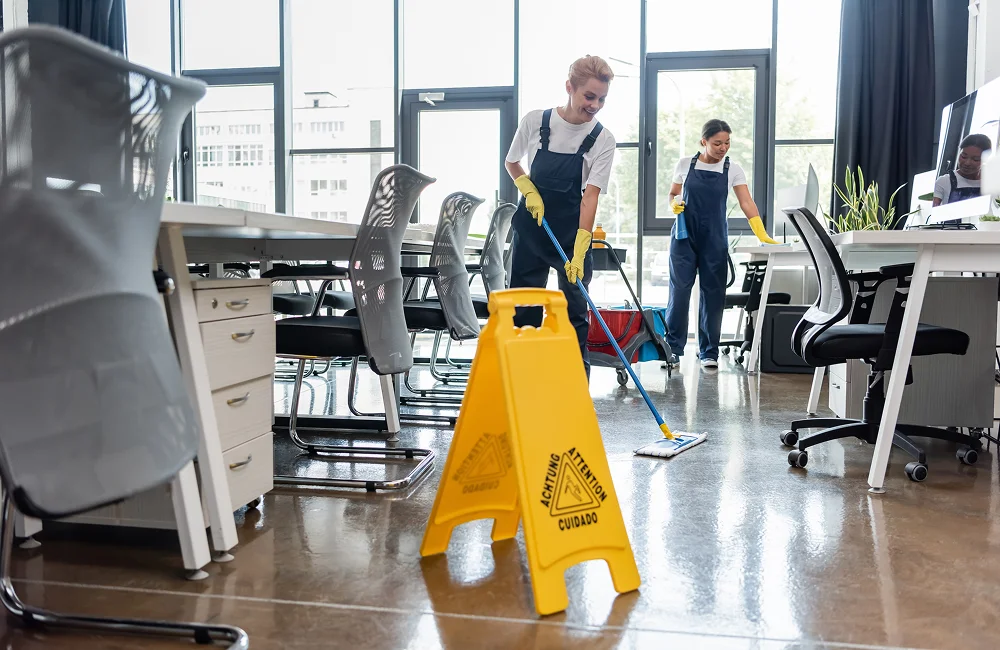  Team managing janitorial services in Atlanta in an open-plan office