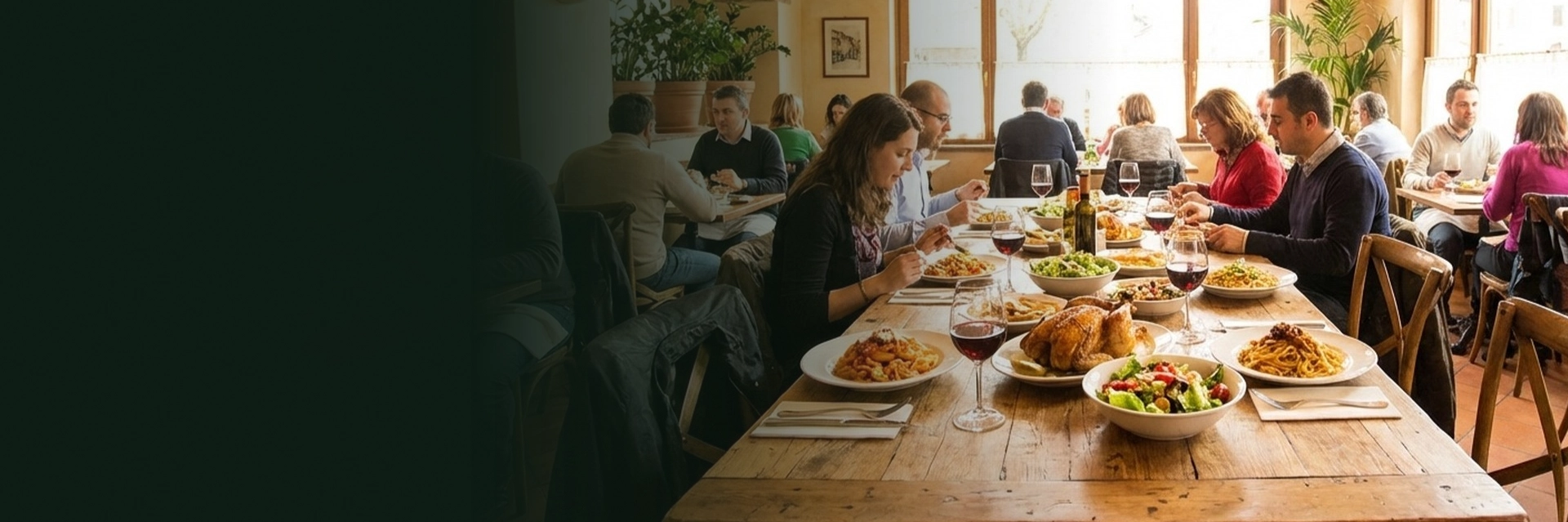 A family enjoying dinner inside an Italian restaurant in Lakeland with a warm and welcoming atmosphere.
