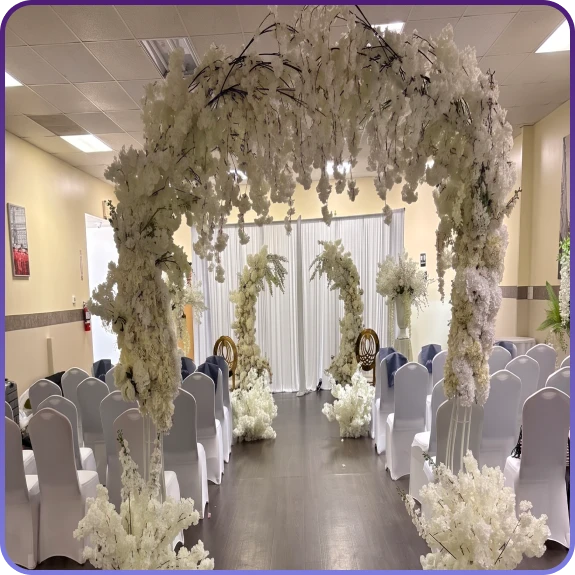 A decorated hall reflecting event space services in Aurora, CO with ambient lighting.