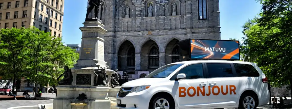  Gros plan sur un écran de toit montrant les services de publicité sur taxis à Montréal
