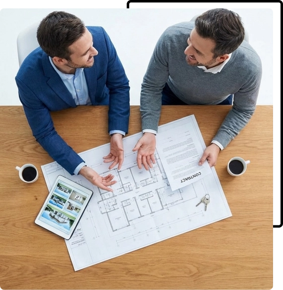 A realtor reviewing documents at a modern office desk in Mississauga.