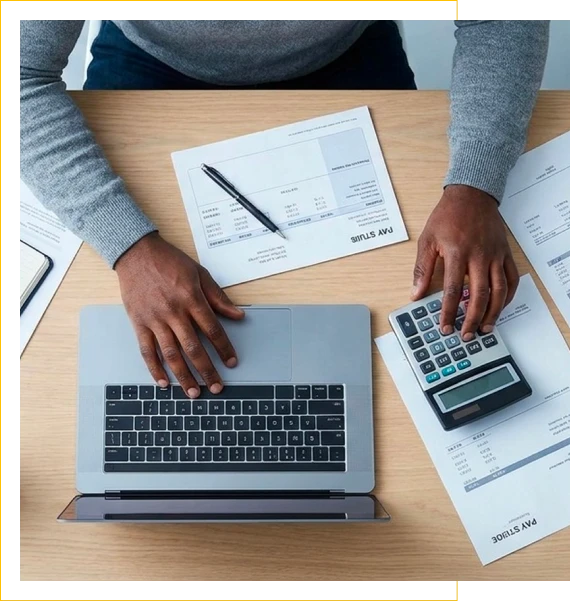A desk shows organized reports for bookkeeping services in Elizabethtown