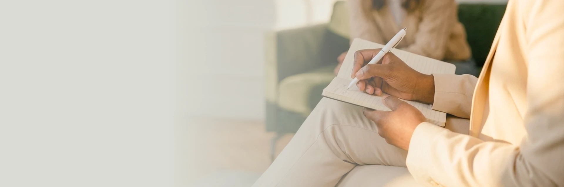 Mental health counselor in Philadelphia speaking with a client