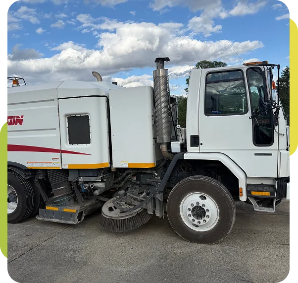 Team from a sweeping company in Greenfield preparing equipment