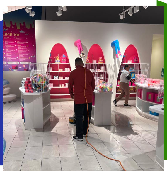 Worker using safe products for green cleaning in Atlanta breakroom