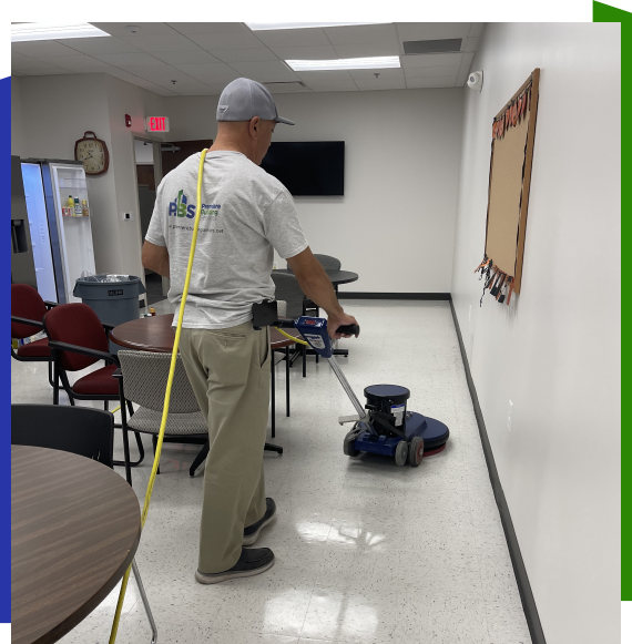 Worker performing restroom sanitization services on building in Atlanta