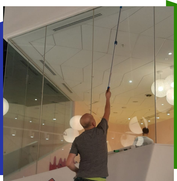 Worker conducting medical office cleaning services in Atlanta workspace