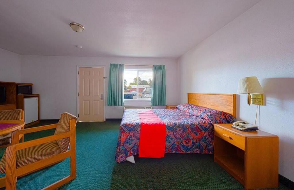 Clean motel rooms in John Day with fresh bedding and simple setup