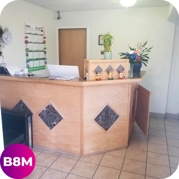 Clean room setup for a motel stay in John Day with simple décor