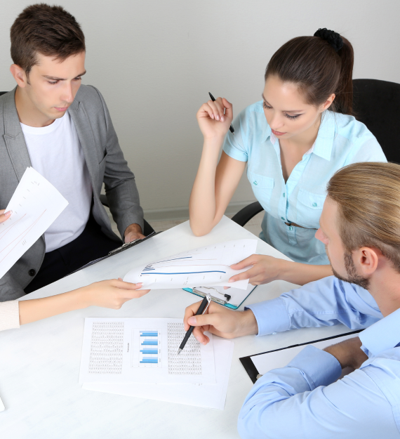 Couple reviewing legal plans options on an informative digital platform.