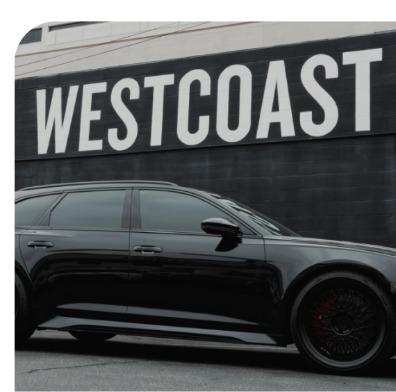 Family arriving at a tire and auto repair shop in Los Angeles for service