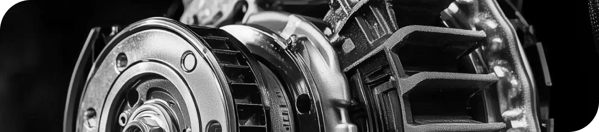 Mechanic removing faulty unit during alternator replacement in Los Angeles