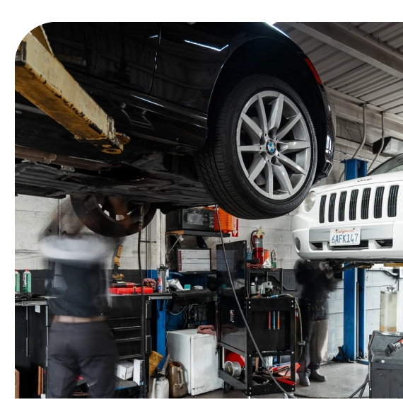 Technician inspecting calipers during brake service in Los Angeles