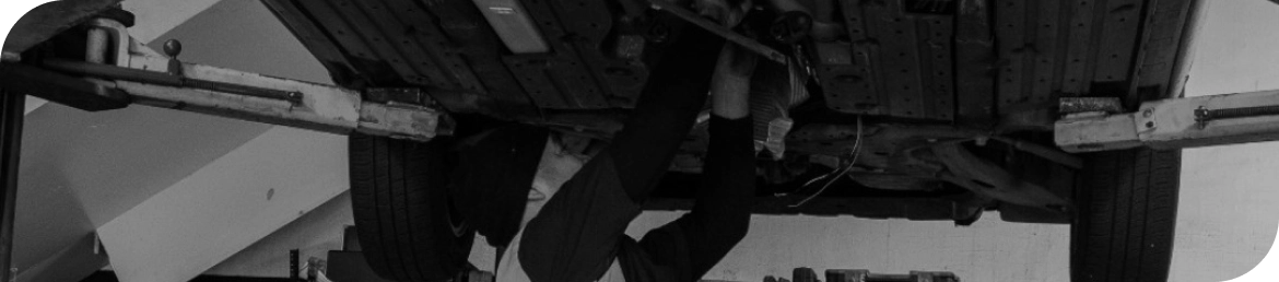 Mechanic replacing brake pads during brake repair in Los Angeles