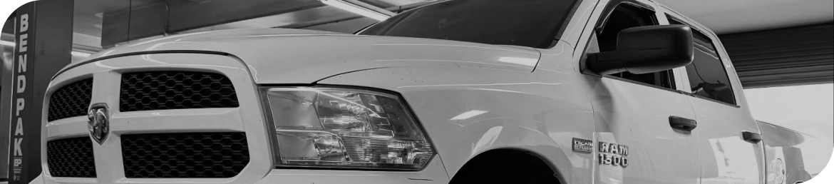 Customer car receiving car battery replacement in Los Angeles garage