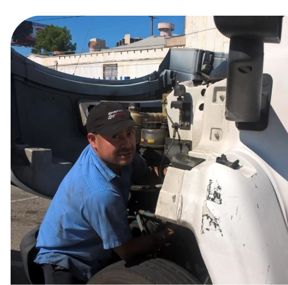 Technician replacing radiator during cooling system repair in Los Angeles