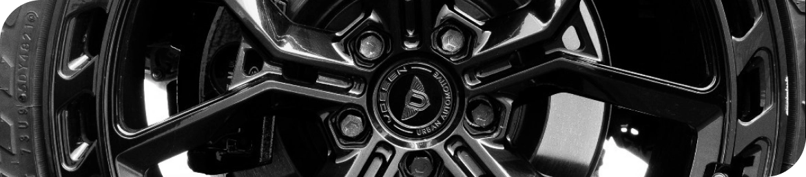 Mobile tire installation van servicing vehicle in Los Angeles parking lot