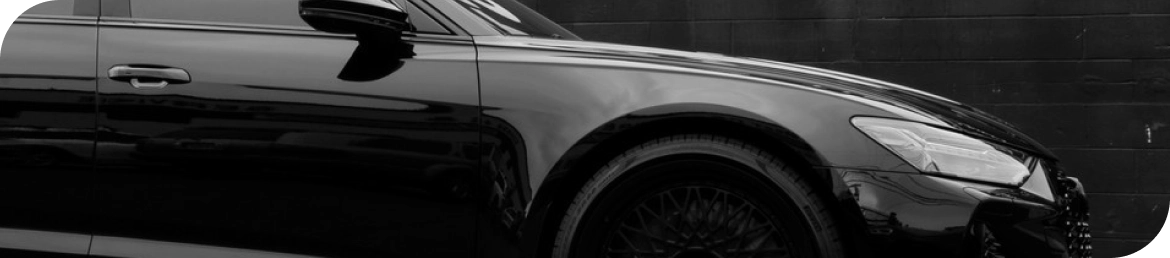 Mobile tire installation van servicing vehicle in Los Angeles parking lot