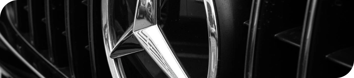 Mobile tire installation van servicing vehicle in Los Angeles parking lot
