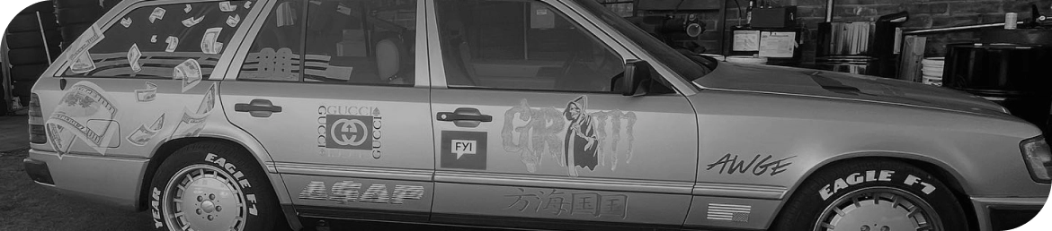 Mobile tire installation van servicing vehicle in Los Angeles parking lot