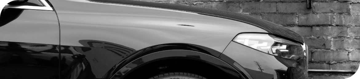 Mobile tire installation van servicing vehicle in Los Angeles parking lot