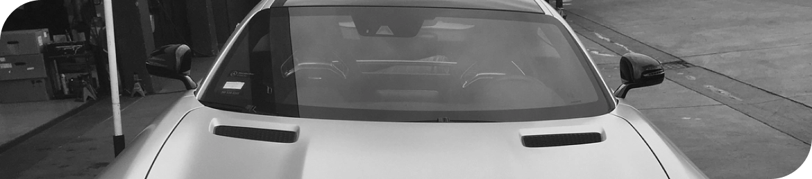 Customer car receiving car battery replacement in Los Angeles garage