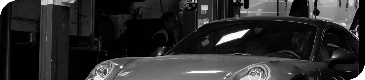 Customer car receiving car battery replacement in Los Angeles garage
