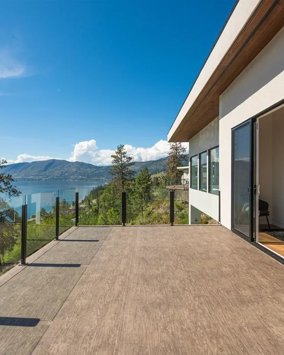 Waterproof vinyl deck flooring installation showing membrane application and edge sealing